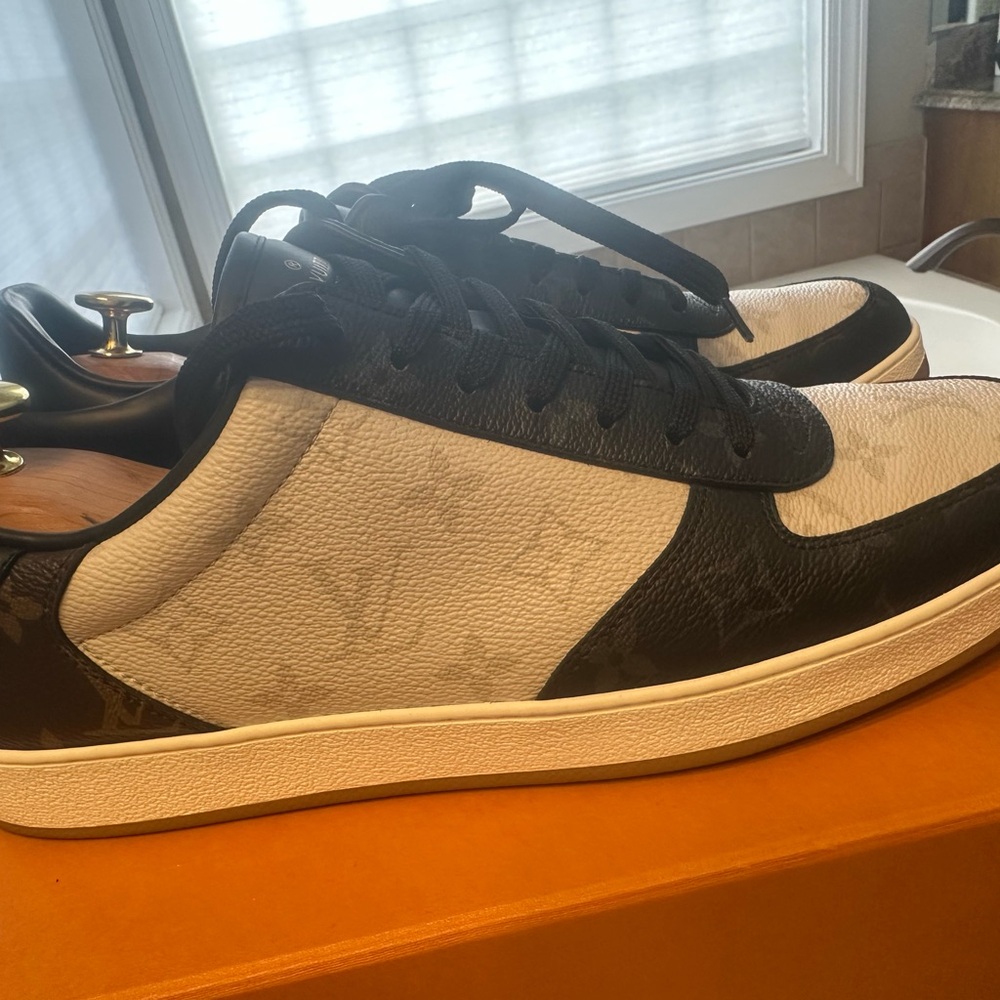 Louis Vuitton Black and White Sneakers with Refined Design